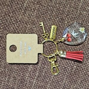 🌺🌺"Unique purse charm or keychain made with a real moth and flowers